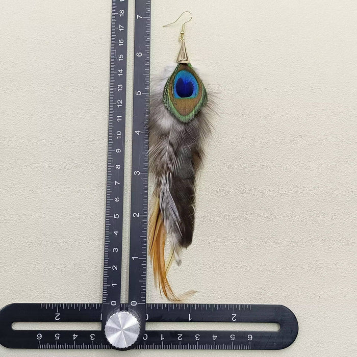 Riikinkukkosulka roikkuvat korvakorut