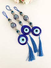 Evil Eye -seinäkoriste keraamisella pallolla