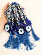 Evil Eye -seinäkoriste keraamisella pallolla