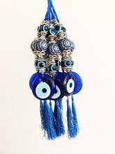 Evil Eye -seinäkoriste keraamisella pallolla