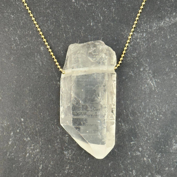 Quartz tip pendant with drilled hole 