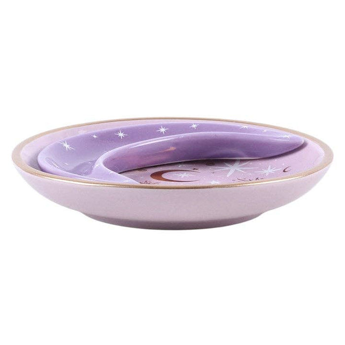 Violetit pinottavat kuu-korulautaset