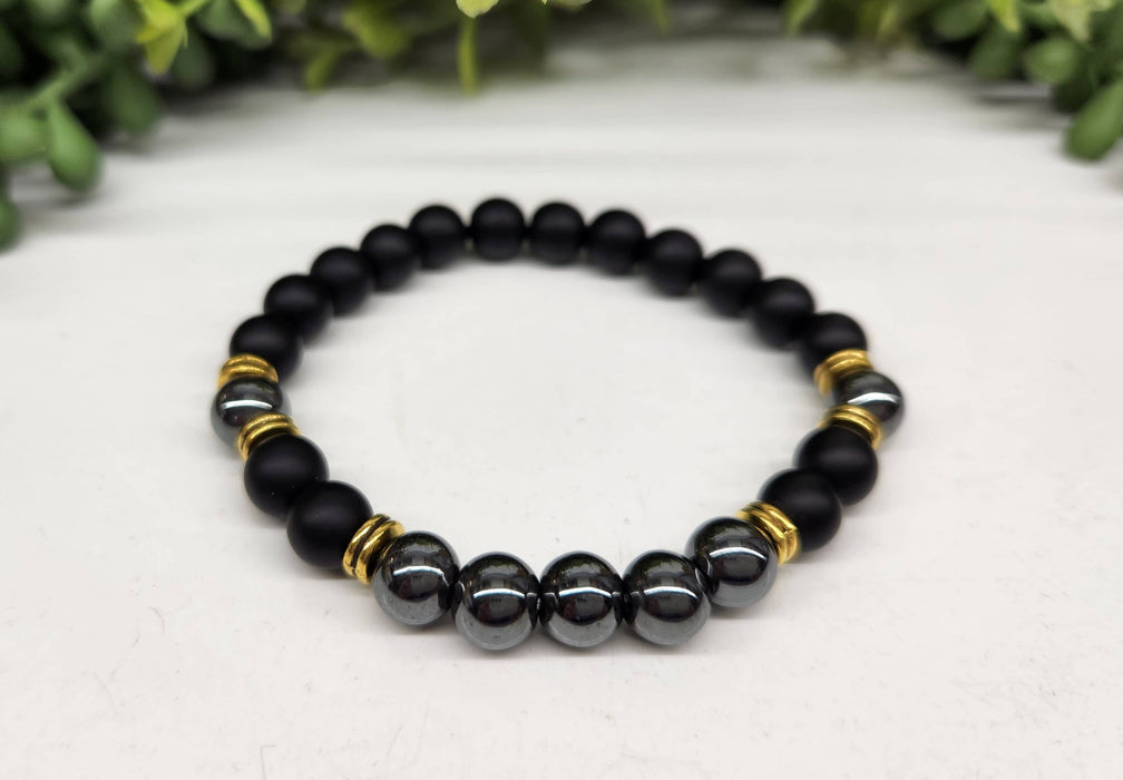 Maadoittava tasapaino: Musta obsidiaani- ja hematiittirannekoru 8 mm