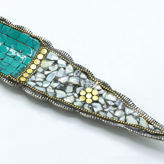 Tiibetiläinen koristeltu suitsukealusta