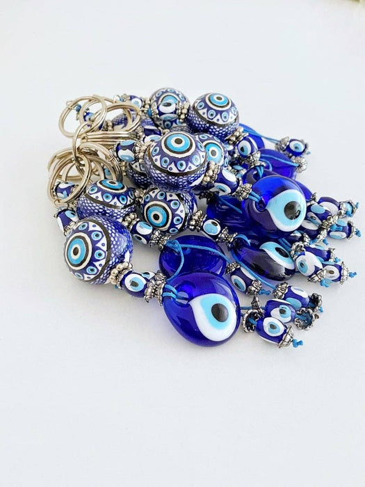 Sininen Evil Eye -avaimenperä keraamisella pallokoristeella