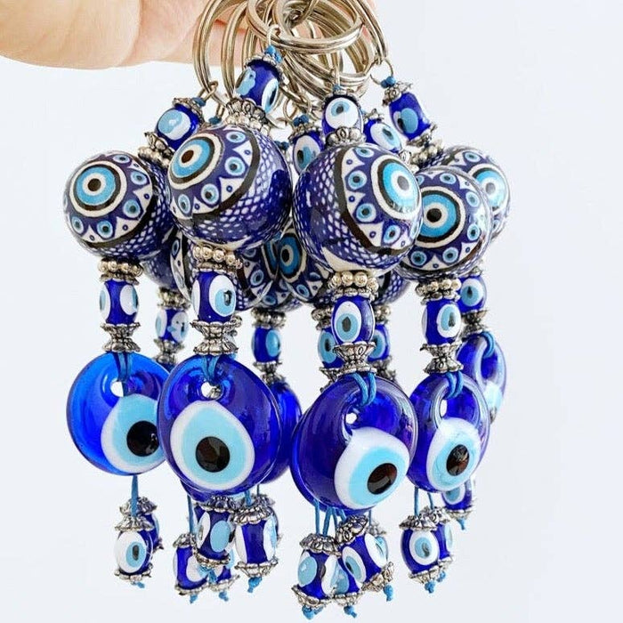 Sininen Evil Eye -avaimenperä keraamisella pallokoristeella