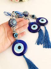 Evil Eye -seinäkoriste keraamisella pallolla