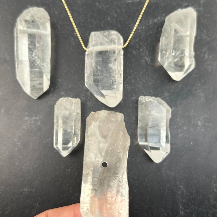 Quartz tip pendant with drilled hole 