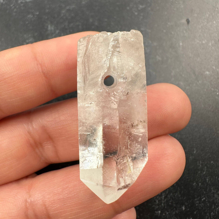 Quartz tip pendant with drilled hole 